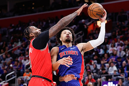 Oct 28, 2023; Detroit, Michigan, USA;  Detroit Pistons guard Cade Cunningham (2) shoots on Chicago Bulls center Andre Drummond (3) in the first half at Little Caesars Arena. Mandatory Credit: Rick Osentoski-USA TODAY Sports