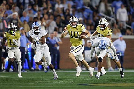 Oct 28, 2023; Atlanta, Georgia, USA; Georgia Tech Yellow Jackets quarterback Haynes King (10) runs the ball against the North Carolina Tar Heels in the second half at Bobby Dodd Stadium at Hyundai Field. Mandatory Credit: Brett Davis-USA TODAY Sports