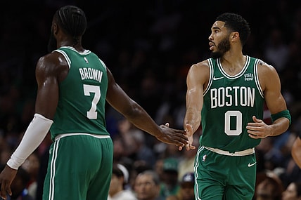 Oct 30, 2023; Washington, District of Columbia, USA; Boston Celtics forward Jayson Tatum (0) celebrates with Celtics guard Jaylen Brown (7) against the Washington Wizards in the third quarter at Capital One Arena. Mandatory Credit: Geoff Burke-USA TODAY Sports