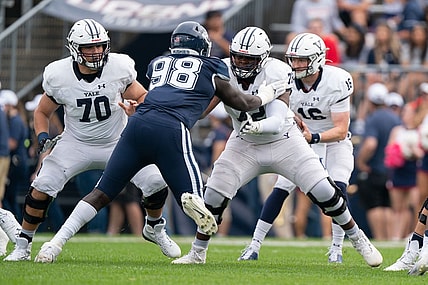 (File photo) Yale Bulldogs offensive lineman Kiran Amegadjie (72) blocks Connecticut Huskies defensive lineman Lwal Uguak (98) during the first half at Rentschler Field at Pratt & Whitney Stadium. Mandatory Credit: Gregory Fisher-USA TODAY Sports