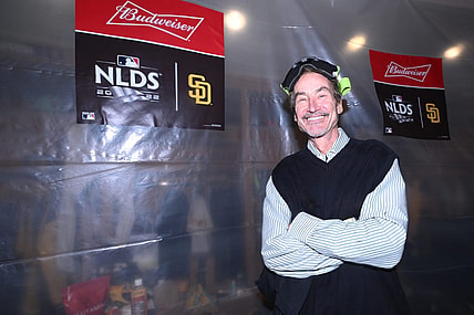 Oct 15, 2022; San Diego, California, USA; San Diego Padres owner Peter Seidler celebrates defeating the Los Angeles Dodgers during game four of the NLDS for the 2022 MLB Playoffs at Petco Park. Mandatory Credit: Orlando Ramirez-USA TODAY Sports