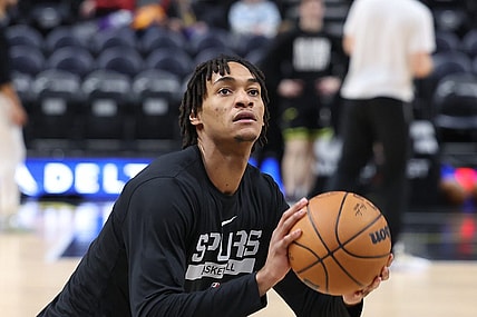 Feb 28, 2023; Salt Lake City, Utah, USA; San Antonio Spurs guard Devin Vassell (24) warms up before a game against the Utah Jazz at Vivint Arena. Mandatory Credit: Rob Gray-USA TODAY Sports