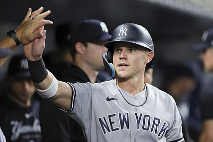 Aug 11, 2023; Miami, Florida, USA; New York Yankees first baseman Jake Bauers (61) celebrates after scoring against the Miami Marlins during the fourth inning at loanDepot Park. Mandatory Credit: Sam Navarro-USA TODAY Sports