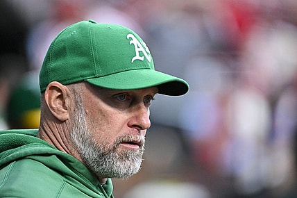 Aug 15, 2023; St. Louis, Missouri, USA;  Oakland Athletics manager Mark Kotsay (7) looks on from the dugout before a game against the St. Louis Cardinals at Busch Stadium. Mandatory Credit: Jeff Curry-USA TODAY Sports