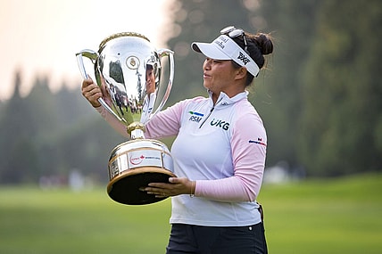 Aug 27, 2023; Vancouver, British Columbia, CAN; Megan Khang holds the championship trophy after the final round of the CPKC Women's Open golf tournament at Shaughnessy Golf & Country Club. Mandatory Credit: Bob Frid-USA TODAY Sports