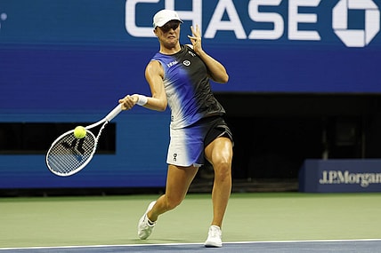 Sep 3, 2023; Flushing, NY, USA; Iga Swiatek of Poland hits a forehand against Jelena Ostapenko of Latvia (not pictured) on day seven of the 2023 U.S. Open tennis tournament at USTA Billie Jean King National Tennis Center. Mandatory Credit: Geoff Burke-USA TODAY Sports