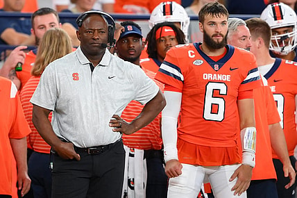 Sep 9, 2023; Syracuse, New York, USA; Syracuse Orange head coach Dino Babers (right) and quarterback Garrett Schrader (6) look on against the Western Michigan Broncos during the second half at the JMA Wireless Dome. Mandatory Credit: Rich Barnes-USA TODAY Sports
