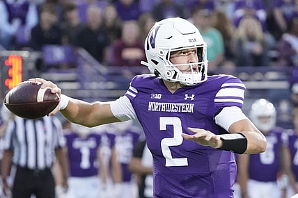 Sep 23, 2023; Evanston, Illinois, USA; Northwestern Wildcats quarterback Ben Bryant (2) looks to pass against the Minnesota Golden Gophers during the first quarter at Ryan Field. Mandatory Credit: David Banks-USA TODAY Sports