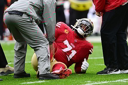 Oct 15, 2023; Cleveland, Ohio, USA; San Francisco 49ers offensive tackle Trent Williams (71) is looked at by trainers during the first half against the Cleveland Browns at Cleveland Browns Stadium. Mandatory Credit: Ken Blaze-USA TODAY Sports