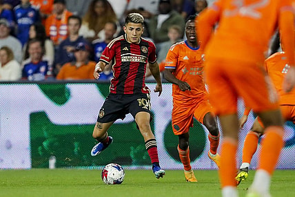 Oct 21, 2023; Cincinnati, Ohio, USA; Atlanta United FC midfielder Thiago Almada (10) dribbles against FC Cincinnati in the second half at TQL Stadium. Mandatory Credit: Katie Stratman-USA TODAY Sports