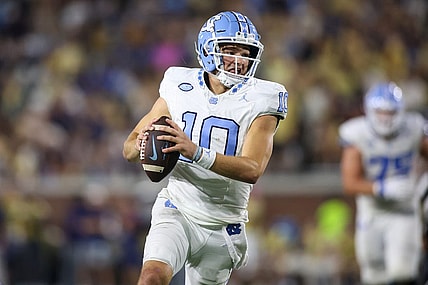 Oct 28, 2023; Atlanta, Georgia, USA; North Carolina Tar Heels quarterback Drake Maye (10) runs the ball against the Georgia Tech Yellow Jackets in the second half at Bobby Dodd Stadium at Hyundai Field. Mandatory Credit: Brett Davis-USA TODAY Sports