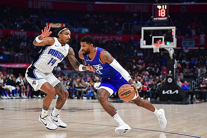 Oct 31, 2023; Los Angeles, California, USA; Los Angeles Clippers forward Paul George (13) moves the ball against during the first half at Crypto.com Arena. Mandatory Credit: Gary A. Vasquez-USA TODAY Sports