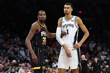 Oct 31, 2023; Phoenix, Arizona, USA; Phoenix Suns forward Kevin Durant #35 guards San Antonio Spurs center Victor Wembanyama #1 during the second half at Footprint Center. Mandatory Credit: Zachary BonDurant-USA TODAY Sports