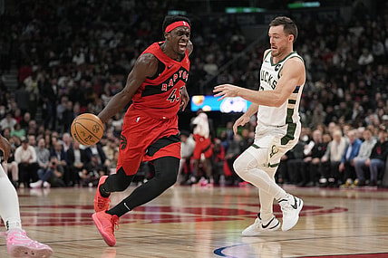 Nov 1, 2023; Toronto, Ontario, CAN; Toronto Raptors forward Pascal Siakam (43) drives to the net past Milwaukee Bucks guard Pat Connaughton (24) during the first half at Scotiabank Arena. Mandatory Credit: John E. Sokolowski-USA TODAY Sports