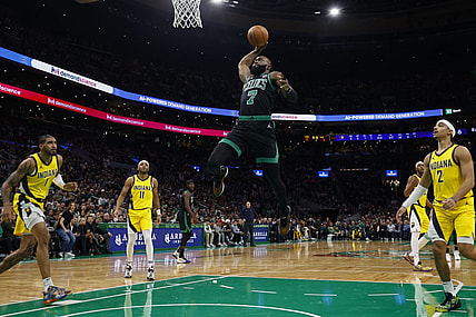 Nov 1, 2023; Boston, Massachusetts, USA; Boston Celtics guard Jaylen Brown (7) goes through the Indiana Pacers defense to dunk during the first quarter at TD Garden. Mandatory Credit: Winslow Townson-USA TODAY Sports