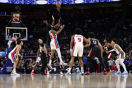Nov 1, 2023; Detroit, Michigan, USA; Portland Trail Blazers center Deandre Ayton (2) wins the tipoff over Detroit Pistons forward Marvin Bagley III (35) in the first half at Little Caesars Arena. Mandatory Credit: Rick Osentoski-USA TODAY Sports