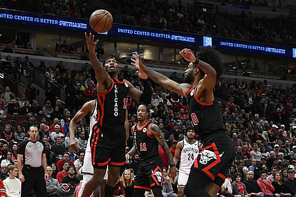 Nov 3, 2023; Chicago, Illinois, USA; Chicago Bulls forward Torrey Craig (13) and guard Coby White (0) chase a rebound against the Brooklyn Nets during the first half at the United Center. Mandatory Credit: Matt Marton-USA TODAY Sports