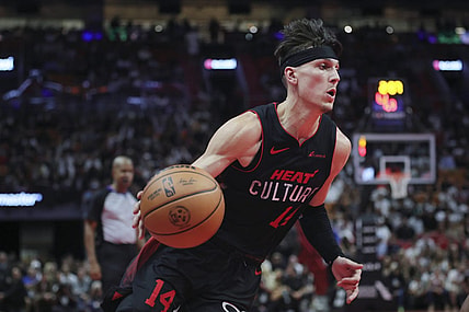 Nov 3, 2023; Miami, Florida, USA; Miami Heat guard Tyler Herro (14) drives to the basket against the Washington Wizards during the fourth quarter at Kaseya Center. Mandatory Credit: Sam Navarro-USA TODAY Sports