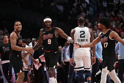 Nov 3, 2023; Portland, Oregon, USA; Portland Trail Blazers small forward Jerami Grant (9) celebrates a three-point shot with teammate Shaedon Sharpe (17) during overtime against the Memphis Grizzlies at Moda Center. Mandatory Credit: Soobum Im-USA TODAY Sports