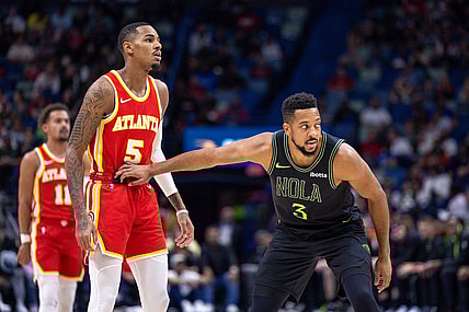 Nov 4, 2023; New Orleans, Louisiana, USA; New Orleans Pelicans guard CJ McCollum (3) guards Atlanta Hawks guard Dejounte Murray (5) during the first half at Smoothie King Center. Mandatory Credit: Stephen Lew-USA TODAY Sports