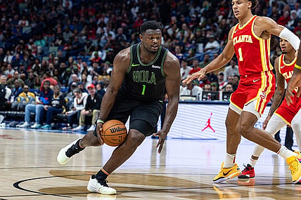 Nov 4, 2023; New Orleans, Louisiana, USA;  New Orleans Pelicans forward Zion Williamson (1) dribbles against Atlanta Hawks forward Jalen Johnson (1) during the second half at Smoothie King Center. Mandatory Credit: Stephen Lew-USA TODAY Sports