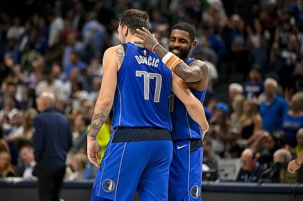 Nov 5, 2023; Dallas, Texas, USA; Dallas Mavericks guard Kyrie Irving (11) hugs guard Luka Doncic (77) during the second half against the Charlotte Hornets at the American Airlines Center. Mandatory Credit: Jerome Miron-USA TODAY Sports