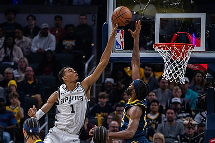Nov 6, 2023; Indianapolis, Indiana, USA; San Antonio Spurs center Victor Wembanyama (1) shoots the ball while Indiana Pacers forward Isaiah Jackson (22) defends in the first half at Gainbridge Fieldhouse. Mandatory Credit: Trevor Ruszkowski-USA TODAY Sports
