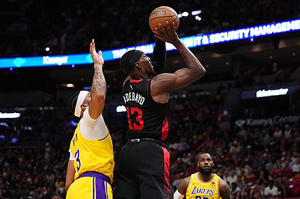 Nov 6, 2023; Miami, Florida, USA; Miami Heat center Bam Adebayo (13) puts up a shot against the Los Angeles Lakers during the first half at Kaseya Center. Mandatory Credit: Jasen Vinlove-USA TODAY Sports