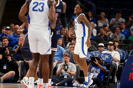 Memphis' Jaykwon Walton (10) celebrates after dunking the ball during the season opener between the University of Memphis and Jackson State University at FedExForum in Memphis, Tenn., on Monday, November 6, 2023.