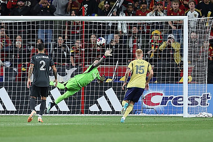 Nov 6, 2023; Sandy, Utah, USA; Houston Dynamo goalkeeper Steve Clark (12) allows a goal scored by Real Salt Lake forward Jefferson Savarino (10) during the second half  at America First Field. Mandatory Credit: Rob Gray-USA TODAY Sports