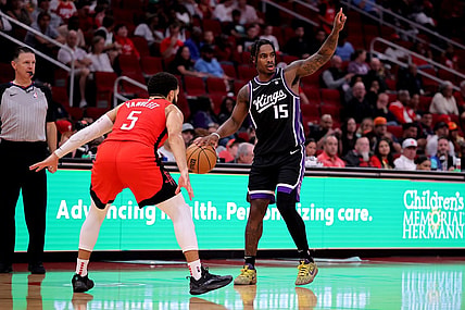 Nov 6, 2023; Houston, Texas, USA; Sacramento Kings guard Davion Mitchell (15) handles the ball against Houston Rockets guard Fred VanVleet (5) during the third quarter at Toyota Center. Mandatory Credit: Erik Williams-USA TODAY Sports