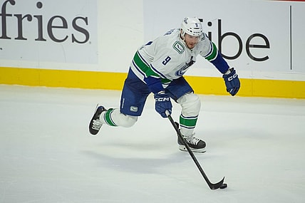 Nov 9, 2023; Ottawa, Ontario, CAN; Vancouver Canucks center J.T. Miller (9) skates with the puck in the third period against the Ottawa Senators at the Canadian Tire Centre. Mandatory Credit: Marc DesRosiers-USA TODAY Sports