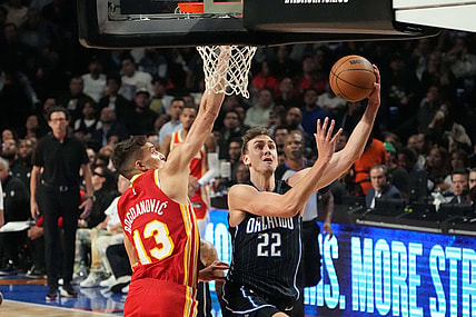 Nov 9, 2023; Mexico City, MEX; Orlando Magic forward Franz Wagner (22) shoots the ball against Atlanta Hawks guard Bogdan Bogdanovic (13) in the first half during the 2023 NBA Mexico City Game at the Arena CDMX. Mandatory Credit: Kirby Lee-USA TODAY Sports