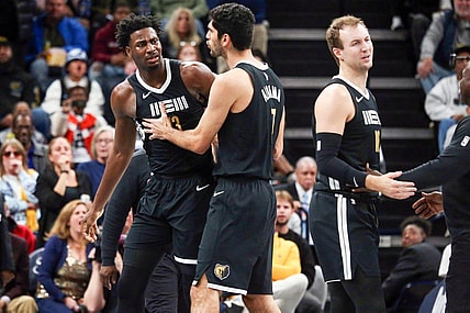 Nov 10, 2023; Memphis, Tennessee, USA; Memphis Grizzlies forward-center Jaren Jackson Jr. (13) held back by forward-center Santi Aldama (7) after being called for two technical fouls during the second half against the Utah Jazz at FedExForum. Mandatory Credit: Petre Thomas-USA TODAY Sports