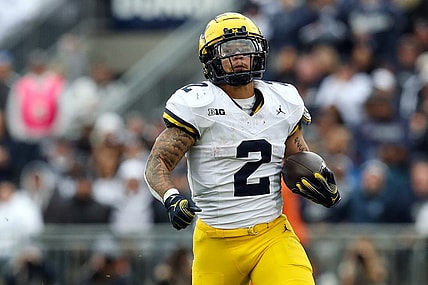 Nov 11, 2023; University Park, Pennsylvania, USA; Michigan Wolverines running back Blake Corum (2) runs the ball against the Penn State Nittany Lions during the second quarter at Beaver Stadium. Michigan won 24-15. Mandatory Credit: Matthew O'Haren-USA TODAY Sports