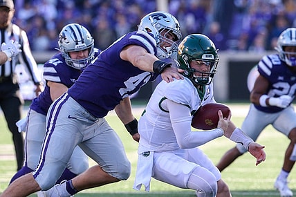 Nov 11, 2023; Manhattan, Kansas, USA; Baylor Bears quarterback Blake Shapen (12) is sacked by Kansas State Wildcats defensive end Cody Stufflebean (47) during the second quarter at Bill Snyder Family Football Stadium. Mandatory Credit: Scott Sewell-USA TODAY Sports