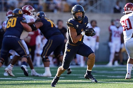 Nov 11, 2023; Berkeley, California, USA; California Golden Bears running back Jaydn Ott (1) rushes for a touchdown against the Washington State Cougars during the second quarter at California Memorial Stadium. Mandatory Credit: Darren Yamashita-USA TODAY Sports