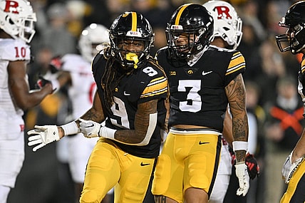 Nov 11, 2023; Iowa City, Iowa, USA; Iowa Hawkeyes running back Jaziun Patterson (9) and wide receiver Kaleb Brown (3) react after a touchdown by Patterson against the Rutgers Scarlet Knights during the fourth quarter at Kinnick Stadium. Mandatory Credit: Jeffrey Becker-USA TODAY Sports