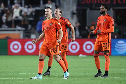 Nov 11, 2023; Houston, Texas, USA; Houston Dynamo defender Erik Sviatchenko (28), midfielder Griffin Dorsey (25), and defender Micael (31) react after the game against Real Salt Lake at Shell Energy Stadium. Mandatory Credit: Troy Taormina-USA TODAY Sports