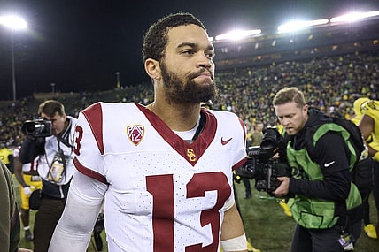 Nov 11, 2023; Eugene, Oregon, USA; USC Trojans quarterback Caleb Williams (13) walks off the field after a game against the Oregon Ducks at Autzen Stadium. Mandatory Credit: Troy Wayrynen-USA TODAY Sports