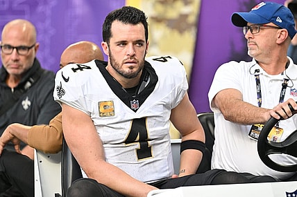 Nov 12, 2023; Minneapolis, Minnesota, USA; New Orleans Saints quarterback Derek Carr (4) is carted off the field after an injury against the Minnesota Vikings during the thrid quarter at U.S. Bank Stadium. Mandatory Credit: Jeffrey Becker-USA TODAY Sports