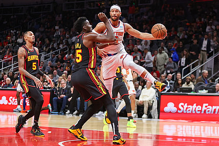Nov 15, 2023; Atlanta, Georgia, USA; New York Knicks guard Josh Hart (3) passes around Atlanta Hawks center Clint Capela (15) in the first quarter at State Farm Arena. Mandatory Credit: Brett Davis-USA TODAY Sports