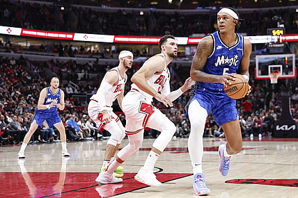 Nov 15, 2023; Chicago, Illinois, USA; Orlando Magic forward Paolo Banchero (5) looks to shoot against Chicago Bulls guard Zach LaVine (8) during the second half at United Center. Mandatory Credit: Kamil Krzaczynski-USA TODAY Sports