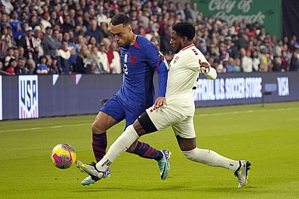 Nov 16, 2023; Austin, Texas, USA; U.S. Men's National team defender Sergino Dest (2) and Trinidad and Tobago defender Andre Raymond (6) battle for the ball during the first half in the Concacaf Quarterfinal at Q2 Stadium. Mandatory Credit: Scott Wachter-USA TODAY Sports