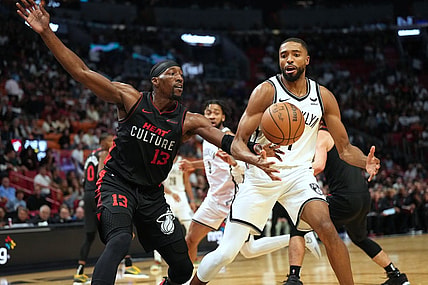 Nov 16, 2023; Miami, Florida, USA; Miami Heat center Bam Adebayo (13) tips the ball away from Brooklyn Nets forward Mikal Bridges (1) in the second half at Kaseya Center. Mandatory Credit: Jim Rassol-USA TODAY Sports