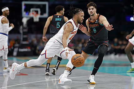 Nov 17, 2023; Washington, District of Columbia, USA; New York Knicks guard Jalen Brunson (11) drives to the basket as Washington Wizards forward Deni Avdija (8) defends in the first quarter at Capital One Arena. Mandatory Credit: Geoff Burke-USA TODAY Sports
