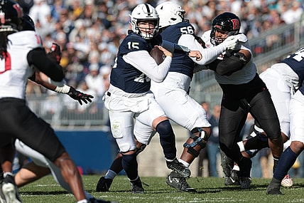 Nov 18, 2023; University Park, Pennsylvania, USA; Penn State Nittany Lions quarterback Drew Allar (15) carries the ball during the first half against the Rutgers Scarlet Knights at Beaver Stadium. Mandatory Credit: Vincent Carchietta-USA TODAY Sports