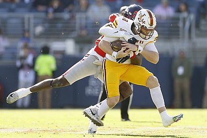 Nov 18, 2023; Oxford, Mississippi, USA; Louisiana Monroe Warhawks quarterback Jiya Wright (18) runs the ball as Mississippi Rebels defensive back Ladarius Tennison (13) makes the tackle during the first half at Vaught-Hemingway Stadium. Mandatory Credit: Petre Thomas-USA TODAY Sports