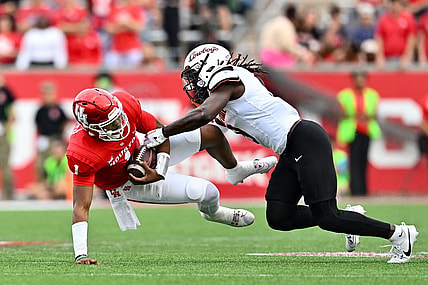 Nov 18, 2023; Houston, Texas, USA; Oklahoma State Cowboys safety Trey Rucker (9) tackles Houston Cougars quarterback Donovan Smith (1) during the first half at TDECU Stadium. Mandatory Credit: Maria Lysaker-USA TODAY Sports
