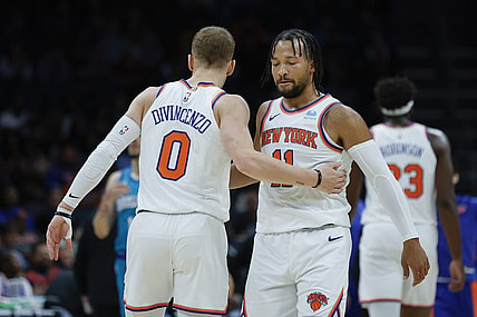 Nov 18, 2023; Charlotte, North Carolina, USA; New York Knicks guard Jalen Brunson (11) embraces guard Donte DiVincenzo (0) during the first quarter against the Charlotte Hornets at Spectrum Center. Mandatory Credit: Nell Redmond-USA TODAY Sports